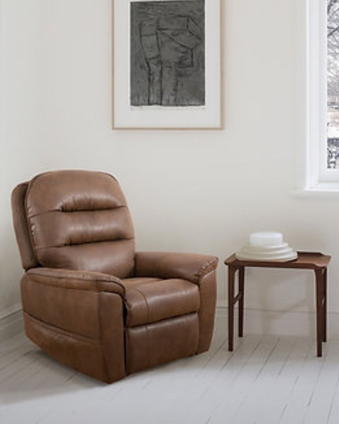 brown leather lift recliner chair staged in brantford