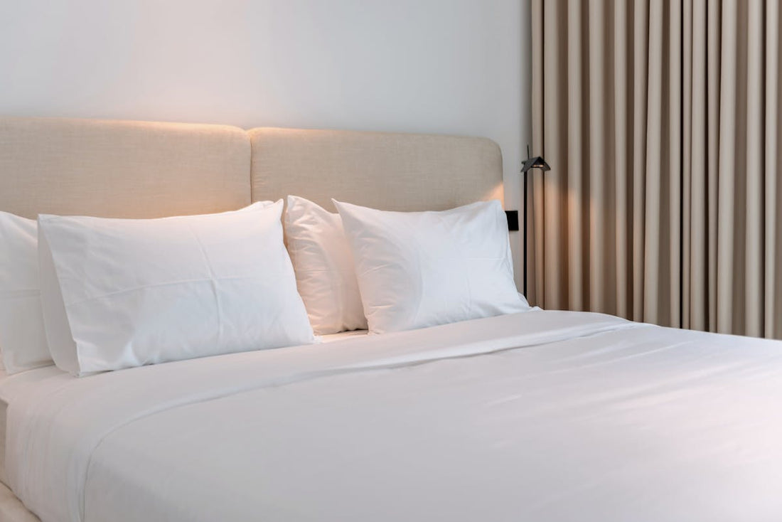 Modern vacation rental bedroom with comfortable bed and neutral decor