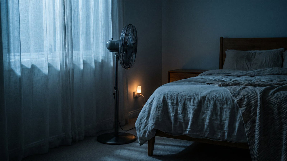 Quiet pedestal fan beside a bed at night - Mattress Miracle Brantford