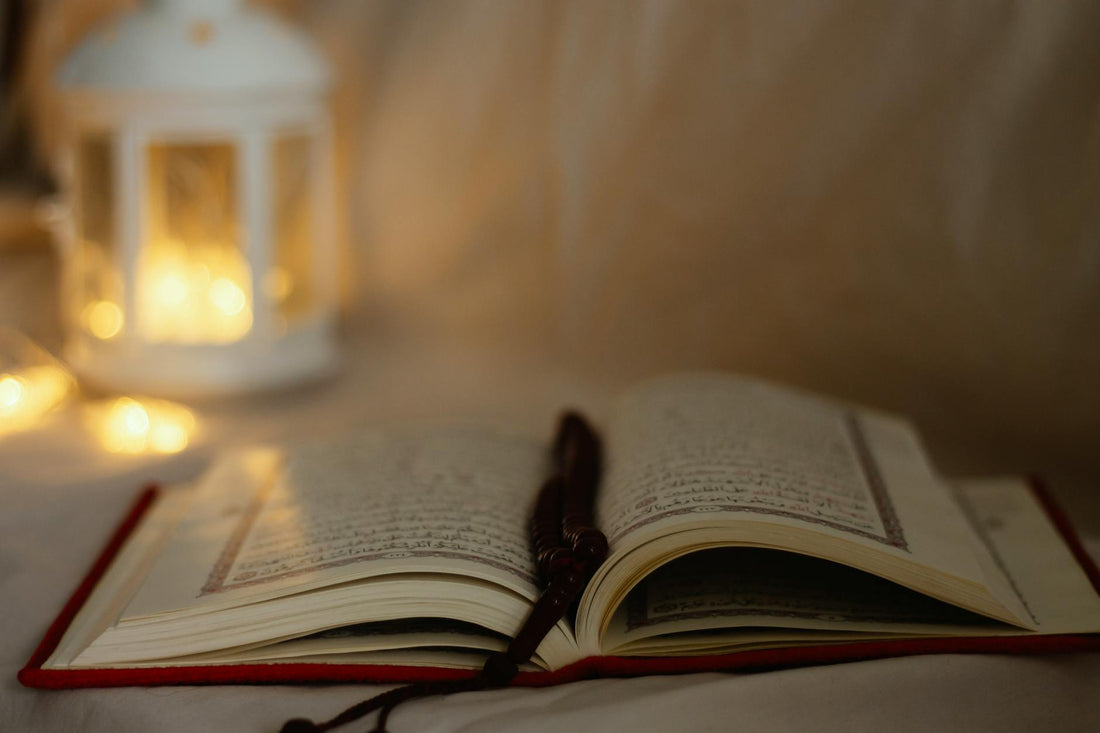 Rosary beads and candle for Catholic bedtime prayer - Mattress Miracle Brantford