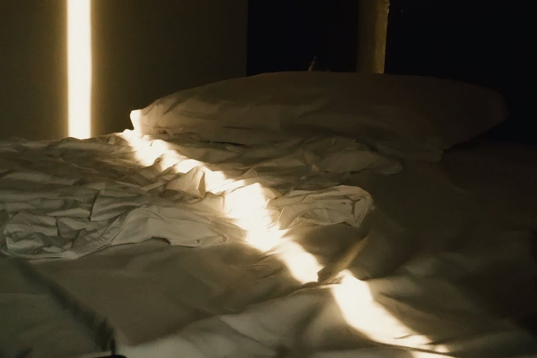 Morning sunlight streaming through bedroom window circadian rhythm wake signal - Mattress Miracle Brantford