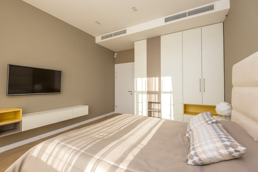 Clean minimalist bedroom with no visible electronics for EMF-free sleeping