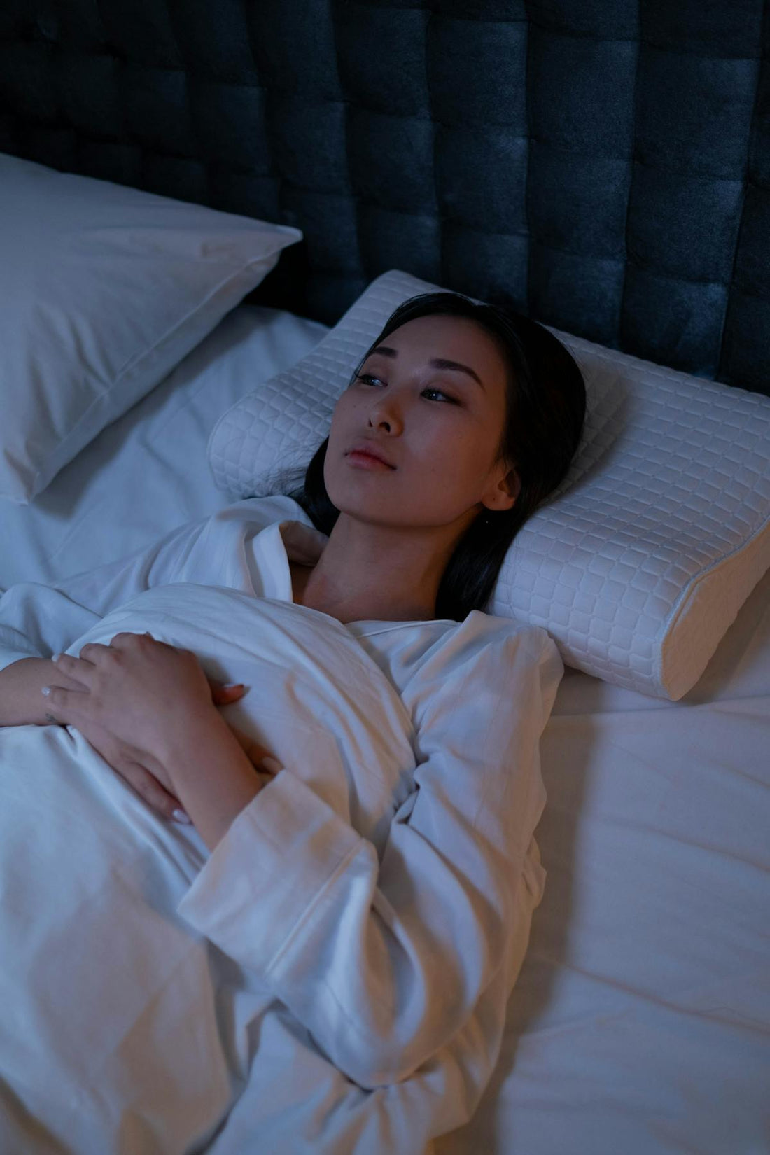 Menopause insomnia guide - woman awake at night - Mattress Miracle Brantford