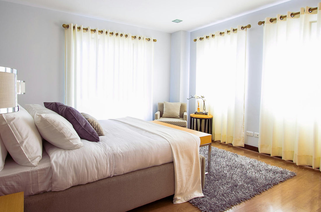Relaxing bedroom with neutral tones and plush bedding