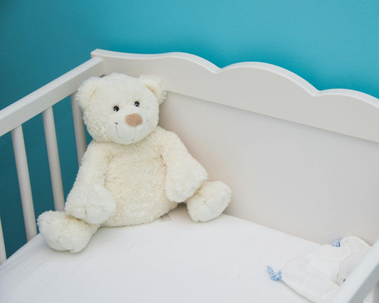 Peaceful nursery room with crib and soft morning light for infant sleep environment - Mattress Miracle Brantford