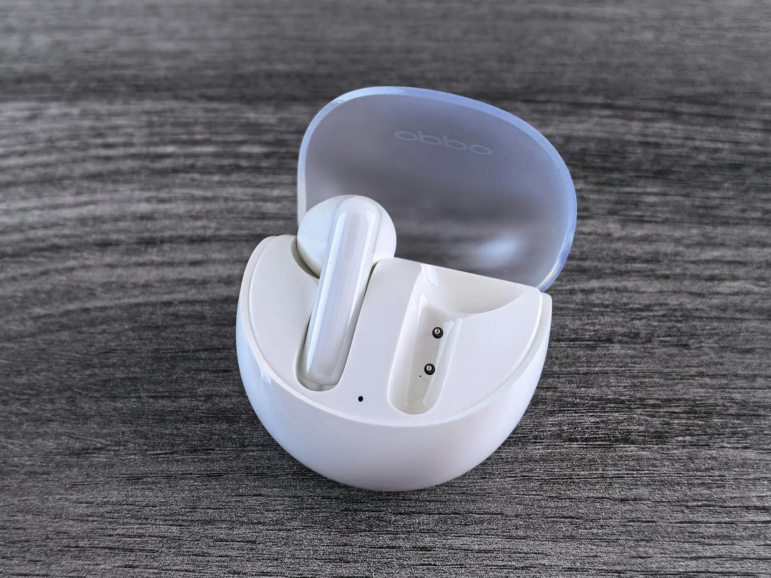 Person wearing sleep headphones comfortably in bed at night - Mattress Miracle Brantford