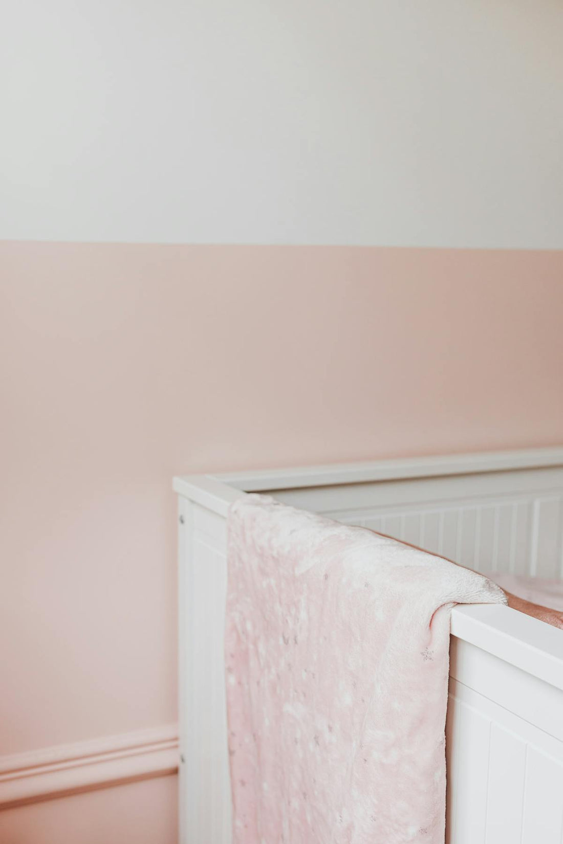 Waterproof crib mattress cover in nursery - Mattress Miracle Brantford