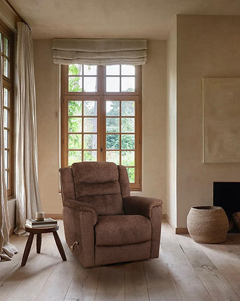 brown swivel recliner on display in brantford