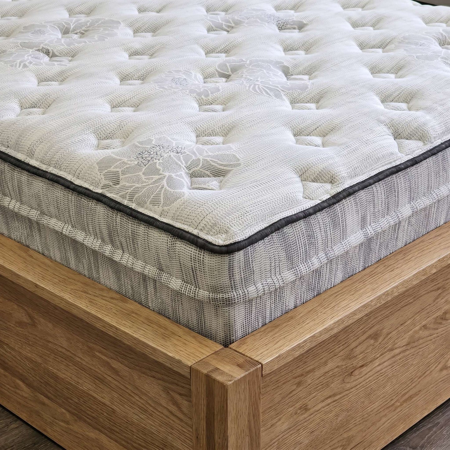 Close-up of the Natura Tranquil's corner, showing the 14-inch edge profile and wrapped coil layer - Mattress Miracle