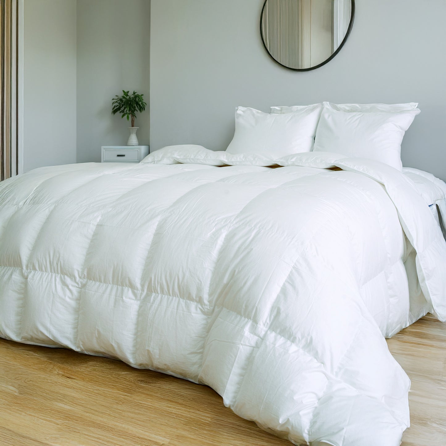 Montpellier 700 loft duck down duvet on bed white - Mattress Miracle Brantford