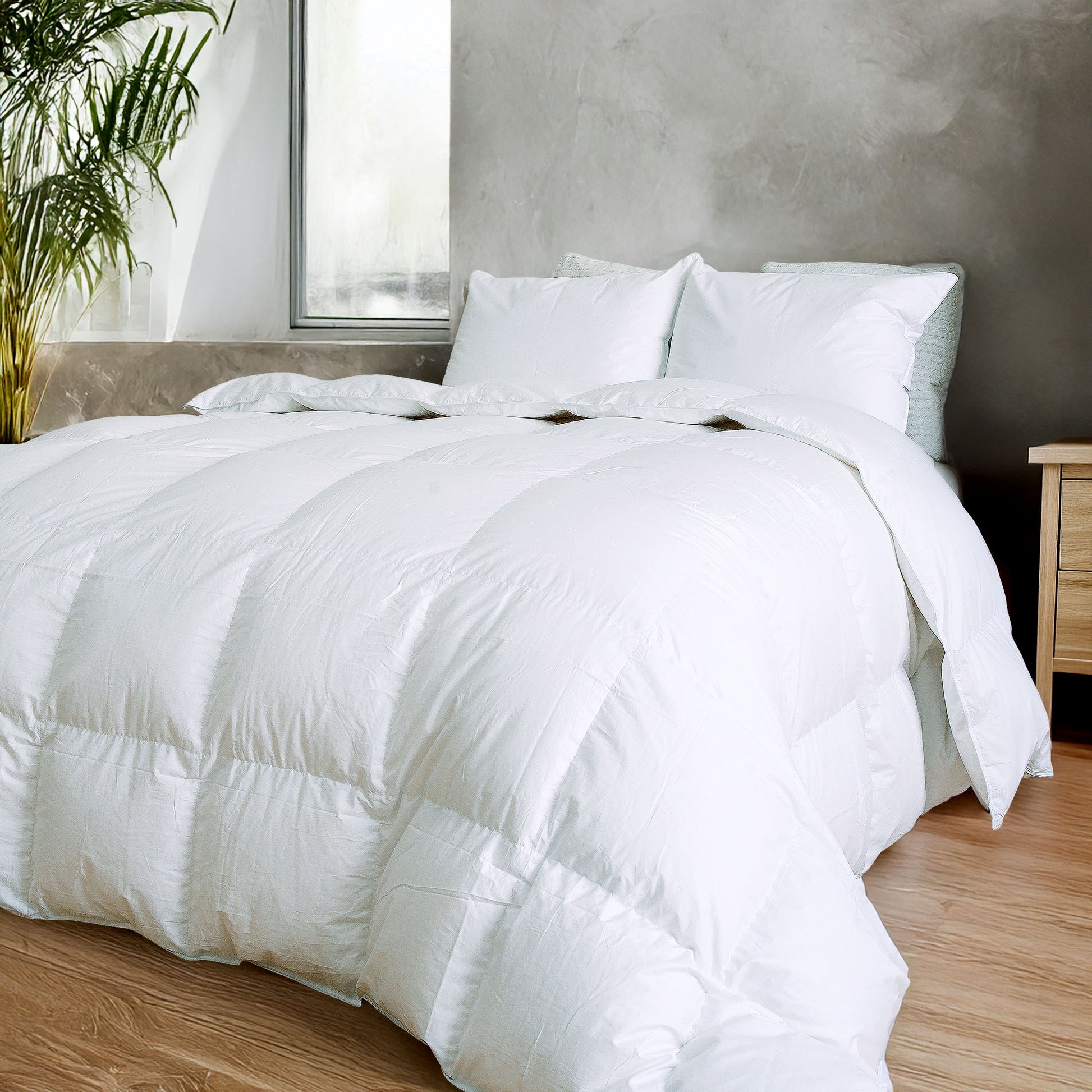 Thionville 625 loft duck down duvet on bed white - Mattress Miracle Brantford